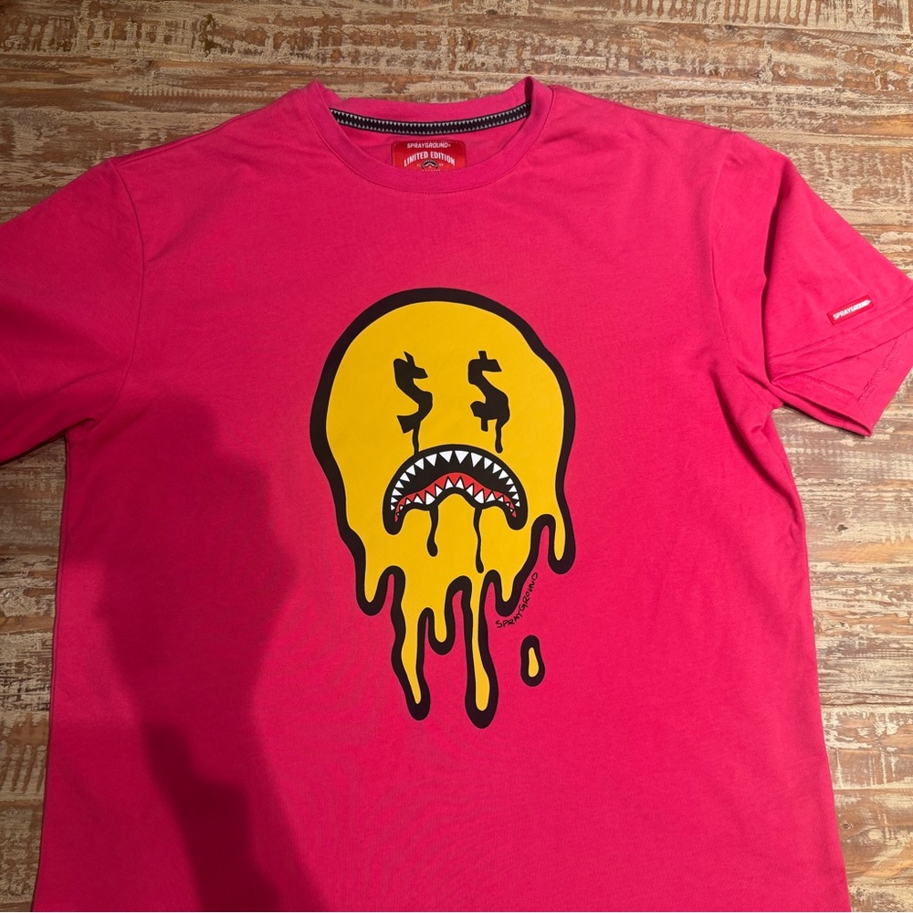 Sprayground Pink T-Shirt with Yellow Dripping Face Graphic